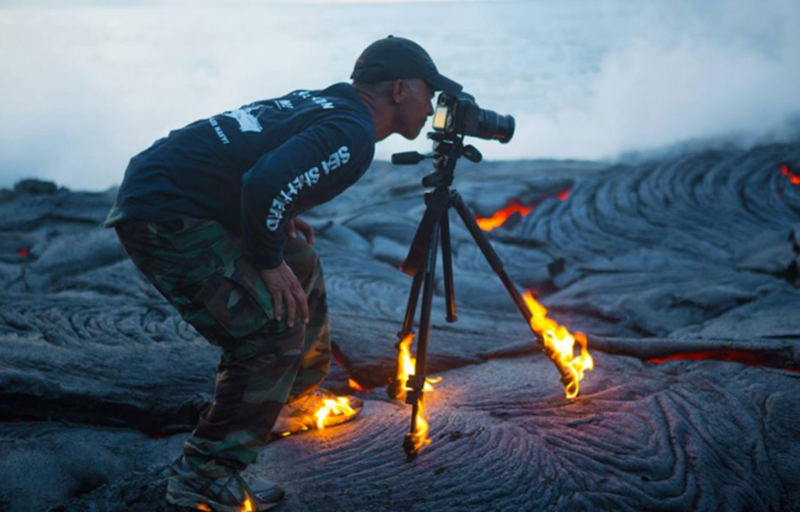 Illustration for article titled The only way this guy could get closer to liquid lava is showering in it